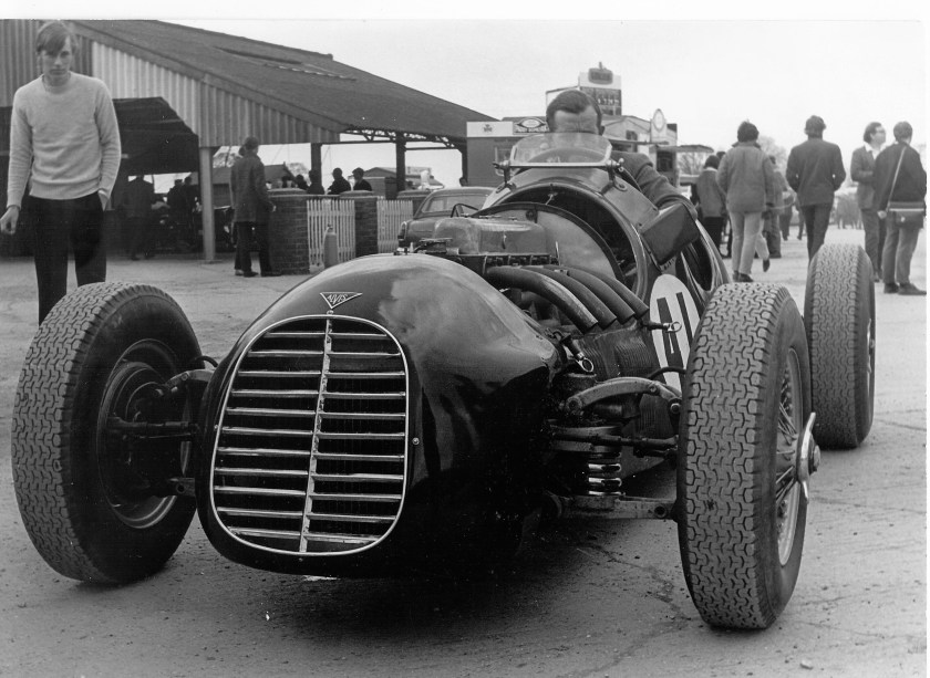 This is the Clinkard 4.3 single seater special with Clink at the wheel. The car was still supercharged at this stage. I believe the blower has now been removed and it has conventional SU carburation. It would be interesting to know more of the parts used for its construction. The front suspension bottom arms are standard prewar Alvis with coil spring supports added. 